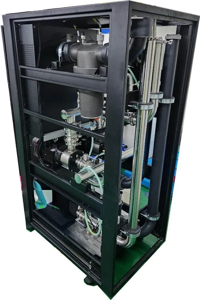 An in-row CDU assembly shown in an OCP document, with pumps, vertical piping and insulated components inside the frame